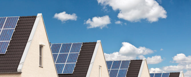 houses with solar panels as environmental upgrades